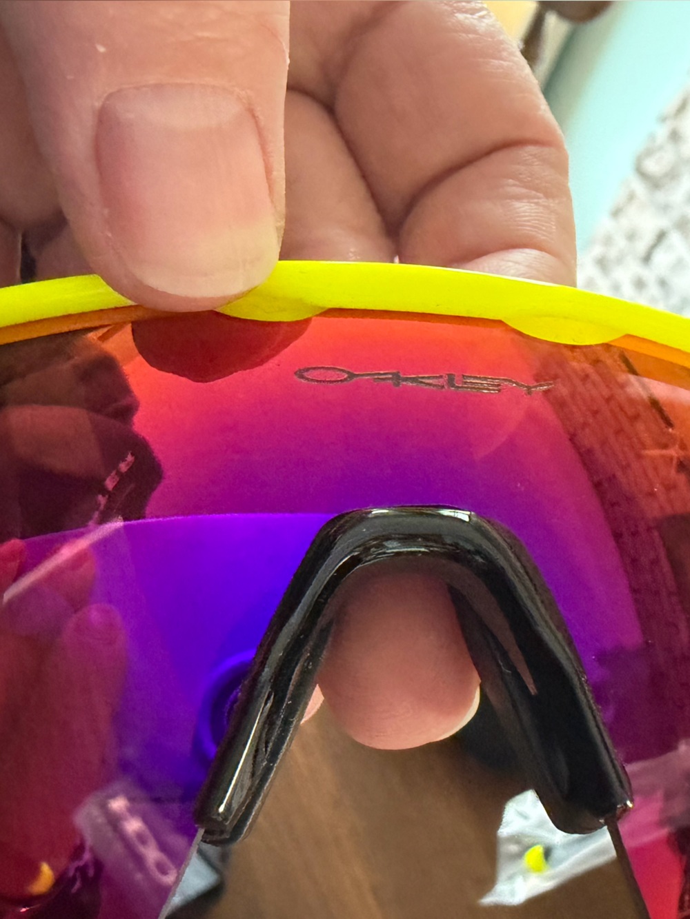 Oakley Sunglasses in Yellow Frame with Purple-Red Mirrored Lens